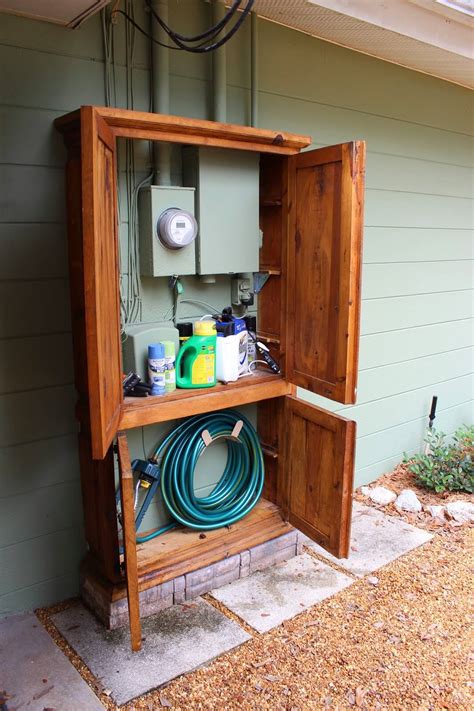 hide electrical box on patio|how to hide eyesore outdoors.